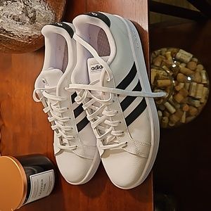 Adidas white sneakers size 11. Barely used